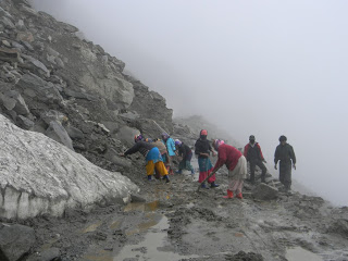 Labourers work at Rahni nullah below Rohtang pass