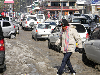 Tourist walks on slush