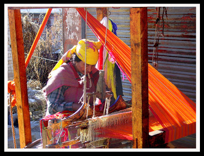 A weaver weaves shawl in Kullu