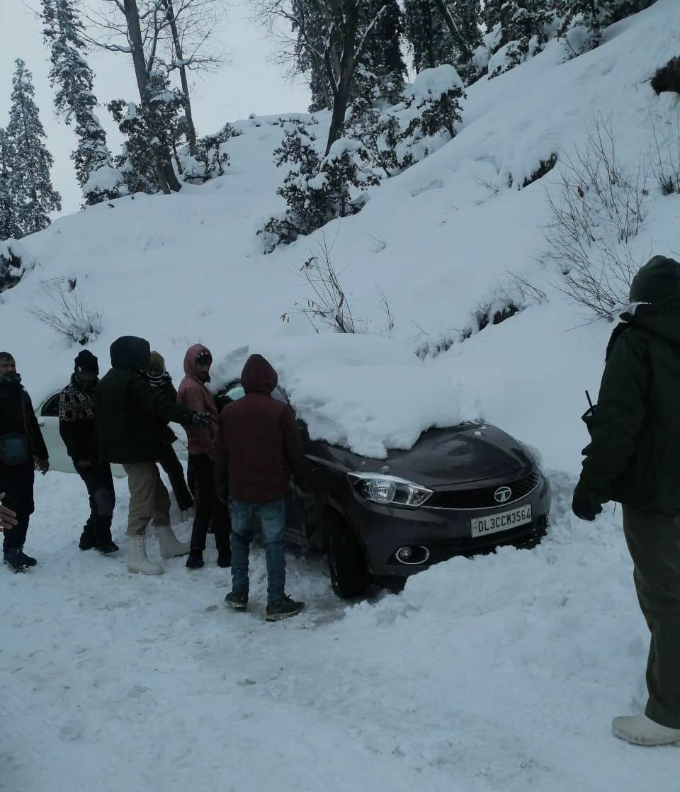 Stranded tourist vehicles being evacuated