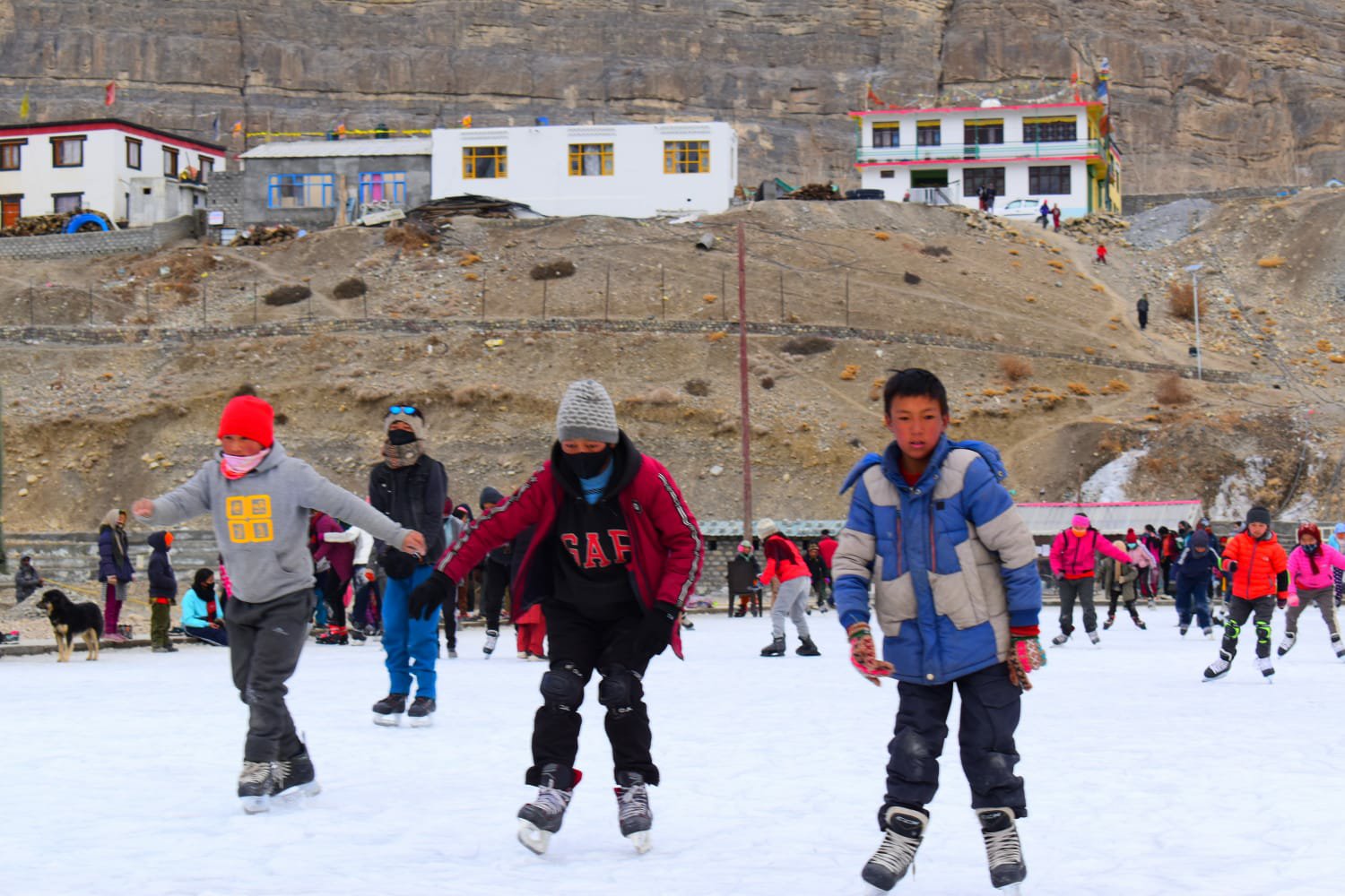 Children learn ice hockey at Kaza in Spiti